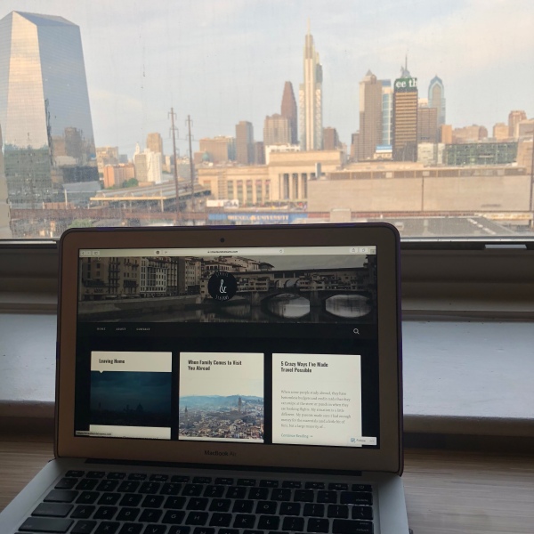 Blogging with Philadelphia skyline.